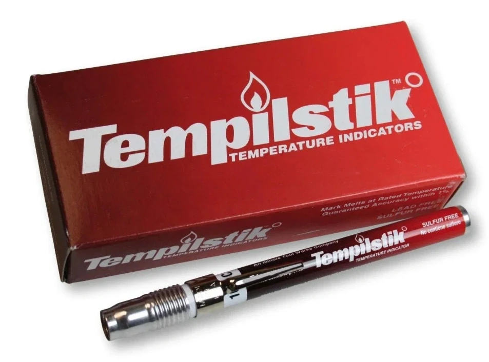 Tempilstik® melting on a hot steel surface — confirming the required preheat temperature has been reached